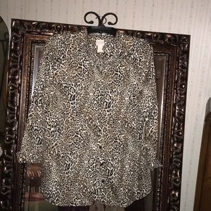 A woman’s leopard shirt